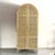 Elevate your home storage with our stunning arched rattan armoire. Expertly crafted from premium solid wood and accented...