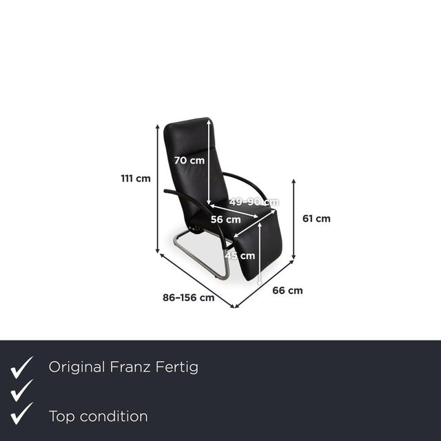 Here you get a recliner chair from Franz Fertig, whose black leather and clean lines will add a modern touch to your...