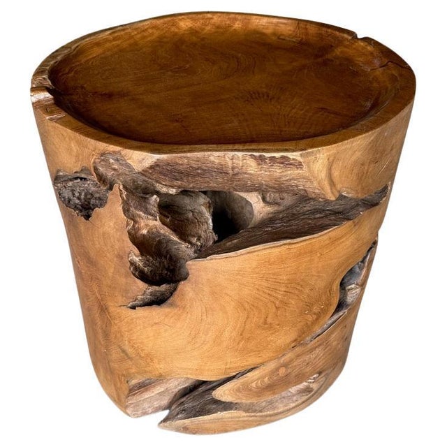 Beautiful century old teak root shaped into a side table. We hand carved the top section into a tray style and added the...
