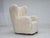 1960s, Danish design. Reupholstered high-backed armchair. Quality genuine sheepskin "Canberra" from Australia with quality...