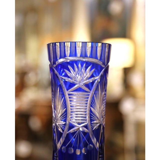 Showcasing the timeless brilliance of Bohemian craftsmanship, this strikingcirca 1950 Czech crystal vase is a fine example...
