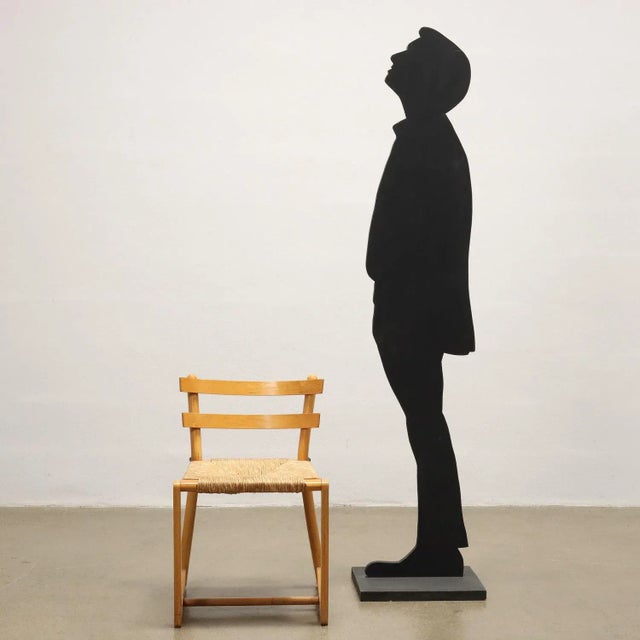 Group of 4 chairs, of which 1 with a different seat, beech wood and plywood, seat in raffia/Vienna straw. This piece is...