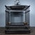 A beautifully crafted vintage Chinese birdcage made of dark wood (possibly ebony) with fine bronze wire bars. It features...