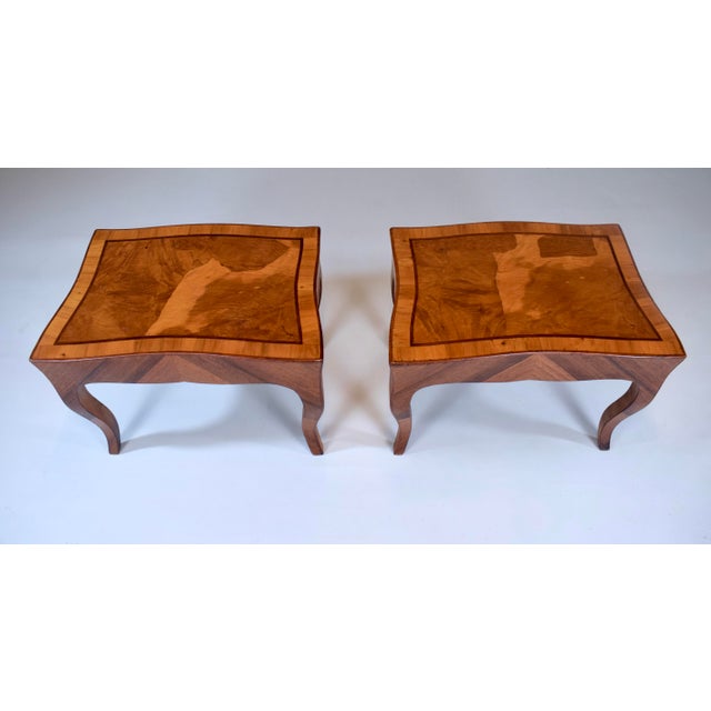 A sinuous pair of Vintage Italian Olive Burl-Wood French style side tables with striking tops, parquetry detailing on the...