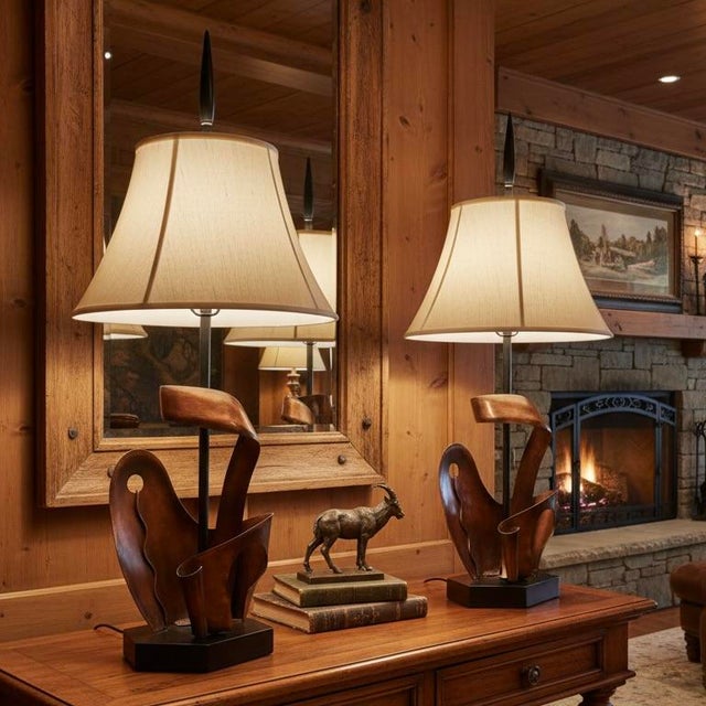 This pair of lamps was designed by Yasha Heifetz, a renowned lighting designer active from the 1940s to the 1960s. Heifetz...