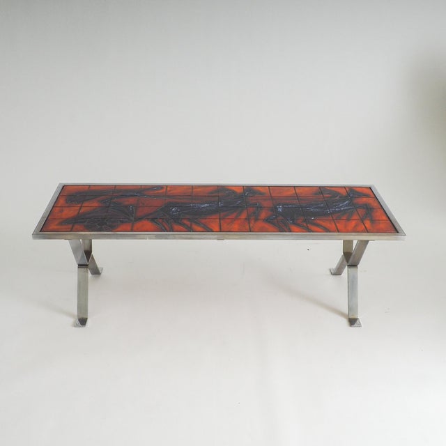 This authentic Bayer coffee table features a hand-glazed ceramic top in perfect condition, showcasing a vibrant "lava"...