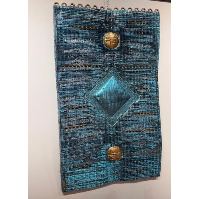 Decorative panel from the "SHIELDS" series by M'Horo'. A sculpture made from a recycled radiator, manipulated by the...