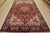 An authentic vintage traditional tribal Heriz rug hand-knotted with fine wool and natural dyes. This area rug features a...