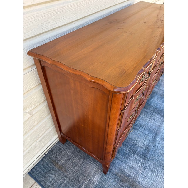 Vintage 1940s Solid Cherry 12-Drawer Serpentine French Provincial Triple Dresser and Matching Mirror Set For Sale - Image 11 of 12