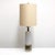 Large-scale soft gray and white satin finish ceramic table lamp by Marshall Studios, broad textured band along the lower...