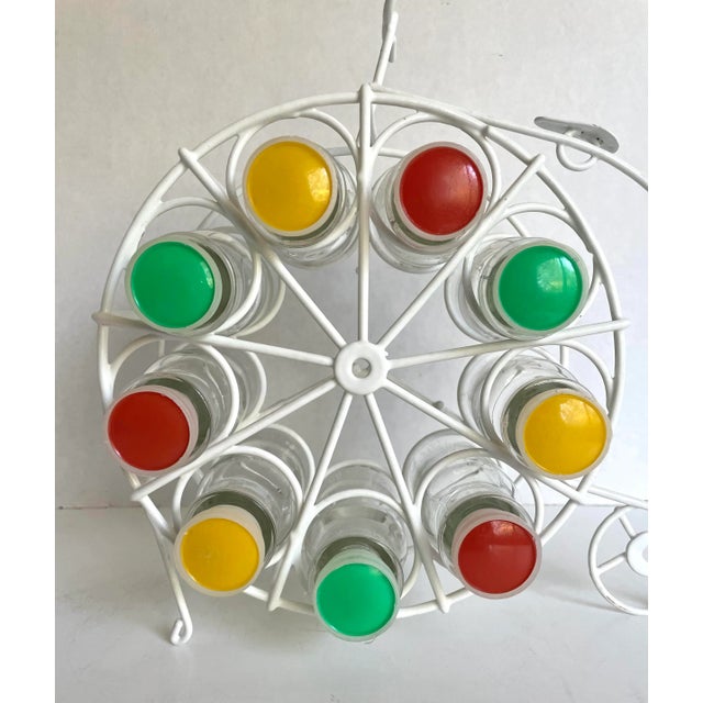 Here is the cutest, happiest seasoning rack there ever was! I just adore the white, metal bicycle base and 9 glass bottles...