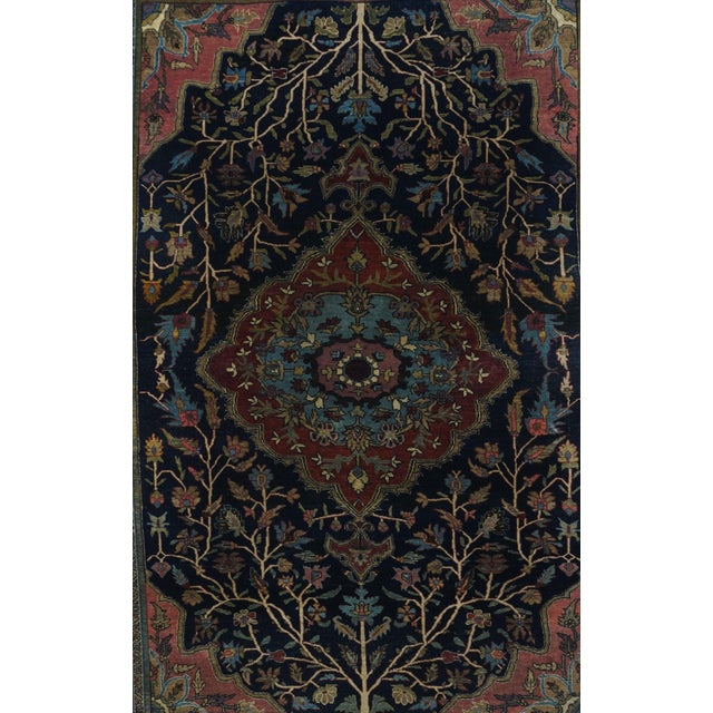 Much in the medallion Heriz style, this west Persian, finely knotted semi-geometric scatter from an accomplished atelier...