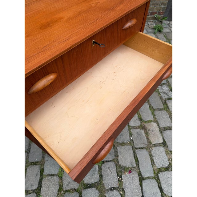 Danish Teak Chest of Drawers with Shell Handles and Lock For Sale - Image 9 of 11