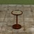 Round side table by Gordon & Jane Martz. The table top is inlaid with cement colored speckle glaze ceramic coin tiles,...