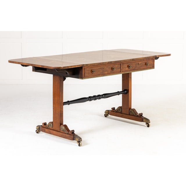 19th century english regency rosewood sofa table a 19th century english regency rosewood sofa table with two drawers. this...