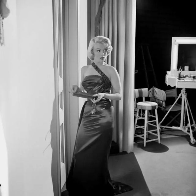 Marilyn Monroe on the Set of "How to Marry a Millionare" This lovely image features Marilyn Monroe on the set of "How to...