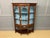 A charming Arts and Crafts period mahogany display cabinet in the manner of Charles Rennie Mackintosh. Well constructed in...