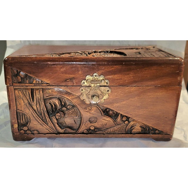 Fun Asian hand carved vanity top wooden box to house anything that fits. Brass tooled latch and top strut.