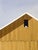 Contemporary Autumn Afternoon by Justin Wheatley | Acrylic on Panel Yellow Barn With Grey Sky For Sale - Image 3 of 8