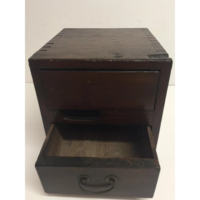 Beautifully made antique Chinese money box having drawer and dovetailed construction, circa 1910. From the collection of...