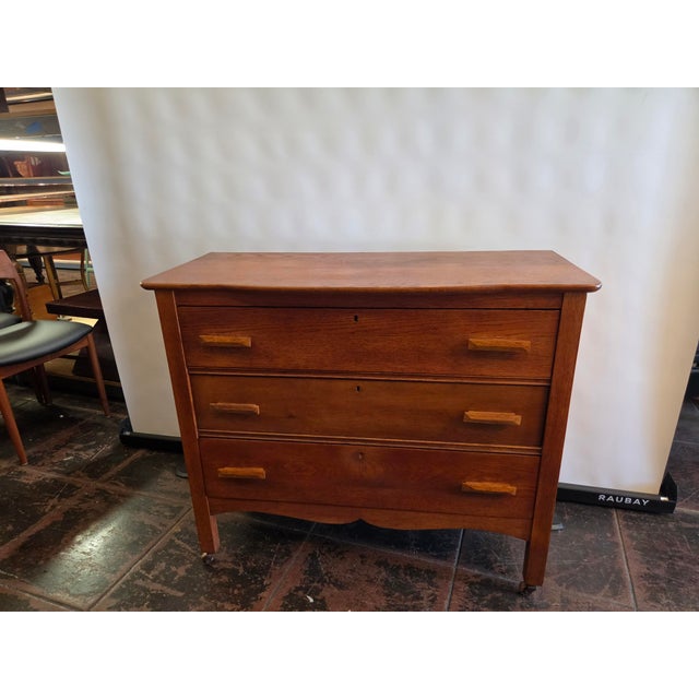 A 1920 Mission Arts & Crafts Movement Solid Oak dresser. Nice color clean too.