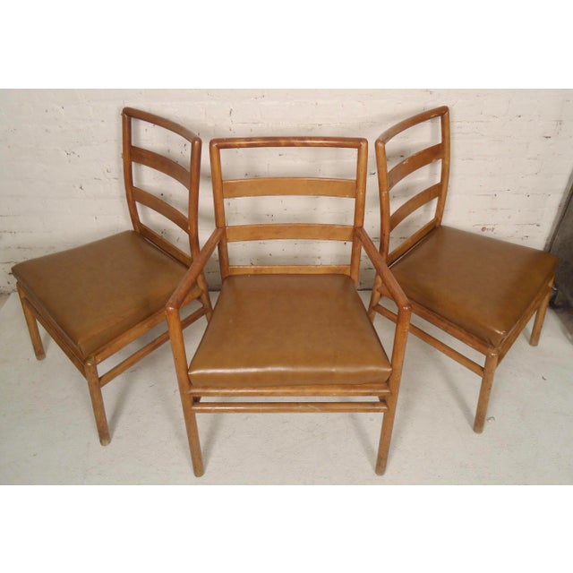 Set of six ladder back chairs by Robsjohn Gibbings for Widdicomb. Pair of arm chairs and four armless. No maker's mark....