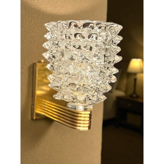 A fine pair of barovier art deco brass mounted murano glass sconces or wall lights wit a precious hand blown " rostrato...