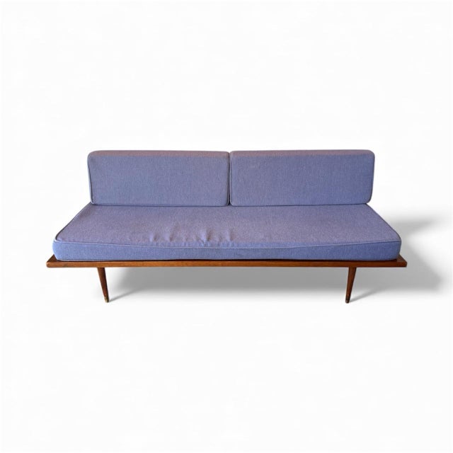 This beautifully crafted Mid-Century Modern daybed features the iconic Yugoslavian floating-frame silhouette with tapered...