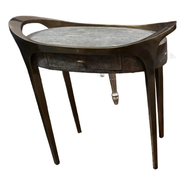Design Plus Gallery presents a Black Shagreen + Bronze Side Table from Ria and Yiouri Augousti. The table offers a luxury...