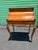 Beautiful French Louis XV style roll-top writing desk featuring rich burl wood veneers, brass gallery, ornate ormolu...