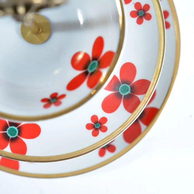 Beautiful item with lots of style. Typical cake stand designed with three layers of porcelain plates. Plates are made of...