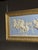 Classic relief plaque in a gold-colored frame. Originating from england. Late 20th century. Subject: "the entry of...
