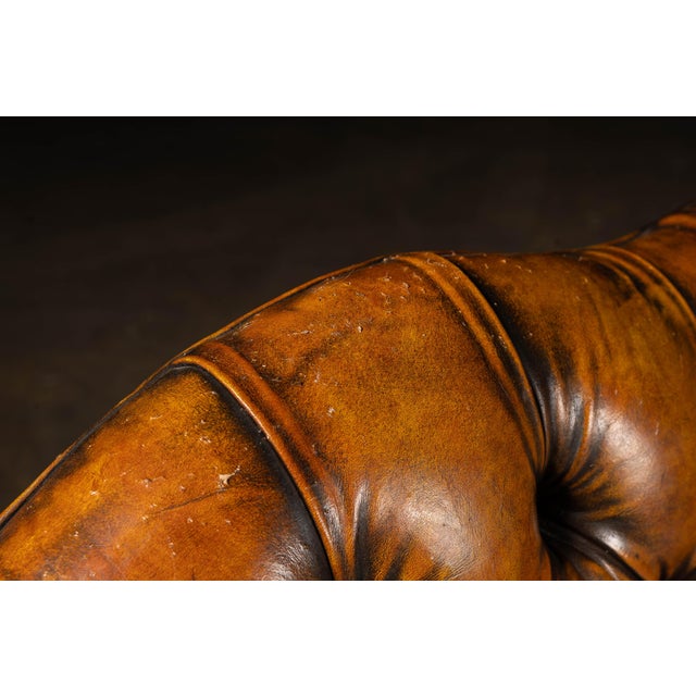 Animal Skin Mid 20th Century Tufted Leather Wingback Armchair in Amber For Sale - Image 7 of 9