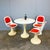 An original set from the 1970s, consisting of three tulip chairs and a matching table. Manufactured by lockhausen...