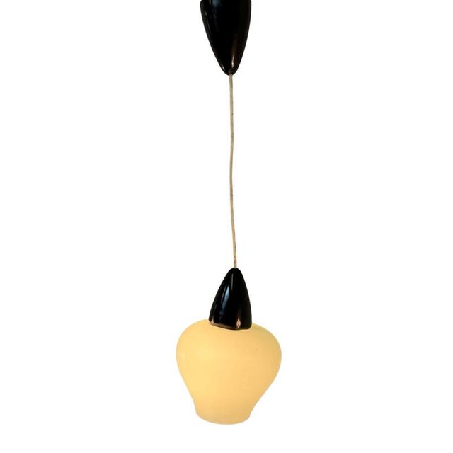 Vintage ceiling mounted lamp. The lamp is in great condition and comes including the bulb and powercord. Translucent /...