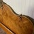 Vintage French Provincial full-size headboard with diamond-matched veneer and carved crest. This headboard features a...