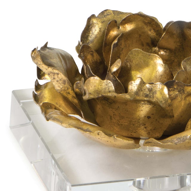 Boasting gold blossom-like accents this piece is a forward-thinking work of art. Placed on top of crystal base completes...