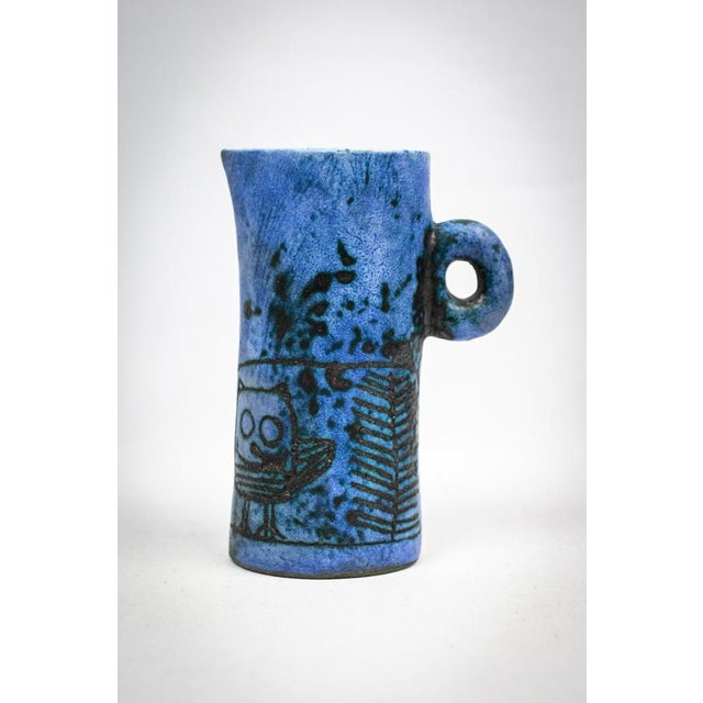 This small glazed earthenware ewer is the work of Jacques Blin (1920–1995), a French ceramist originally trained in...