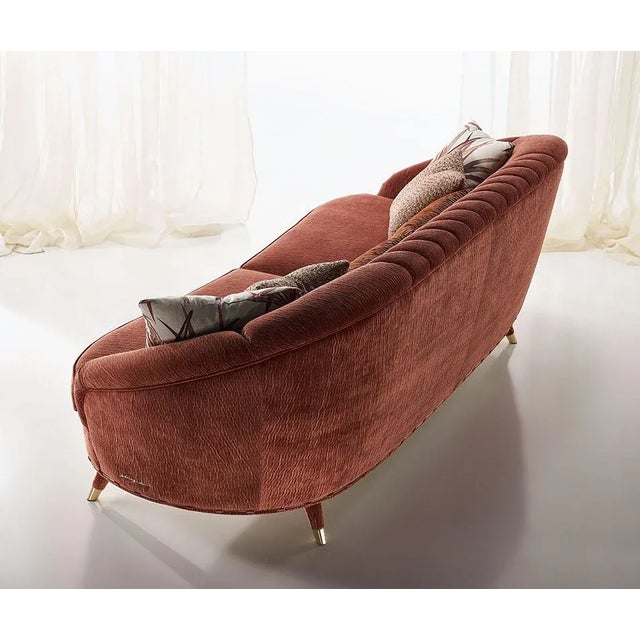 Antibes sofa is a model with clean lines and distinctive shape, upholstered in worked velvet, with wooden legs, profiles...