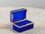 An antique French opaline glass casket box in a striking lapis lazuli color. The polished glass is mounted with gold...