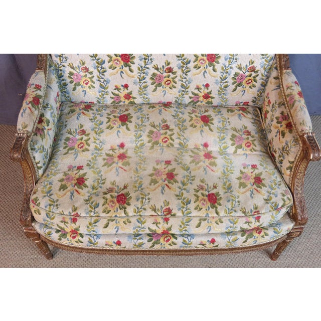 Large Louis XVI style armchair or marquise in giltwood. This chair is in its original condition; we can undertake its...