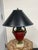 Design Plus Gallery presents a Neoclassical Gilt Patina Red Urn Table Lamp, Figural Handles. This table lamp has a...