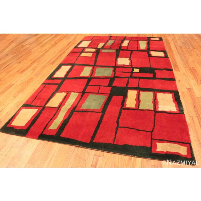 Embodying the artistic innovations from the beginning of the 20th century, this impressive art deco designed Wilton rug is...