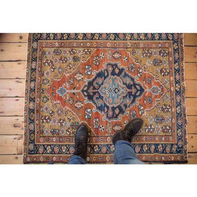 Center medallion with inner partial Herati motif bearing slight asymmetric weight in design mapping. Adorned at either end...