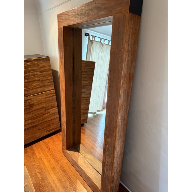 This is a hefty and heavy stunning mirror made from reclaimed wood beams (possibly rail road timbers) that draws loads of...