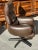 Brown leather office chair with swivel and tilt mechanism and headrest, by Otto Zapf for Knoll. American origin, circa...