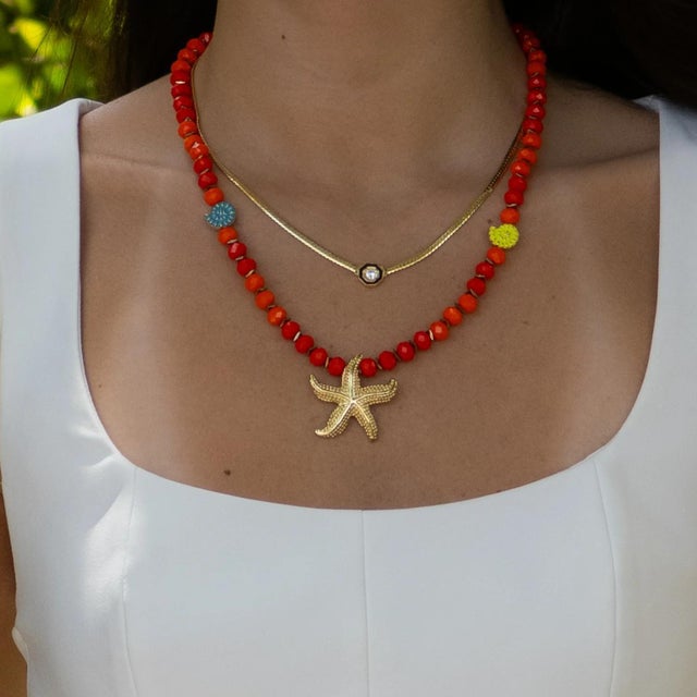 Bring sunshine to your style with the Summer Joy Starfish & Shell Beaded Necklace – a vibrant celebration of beach days,...