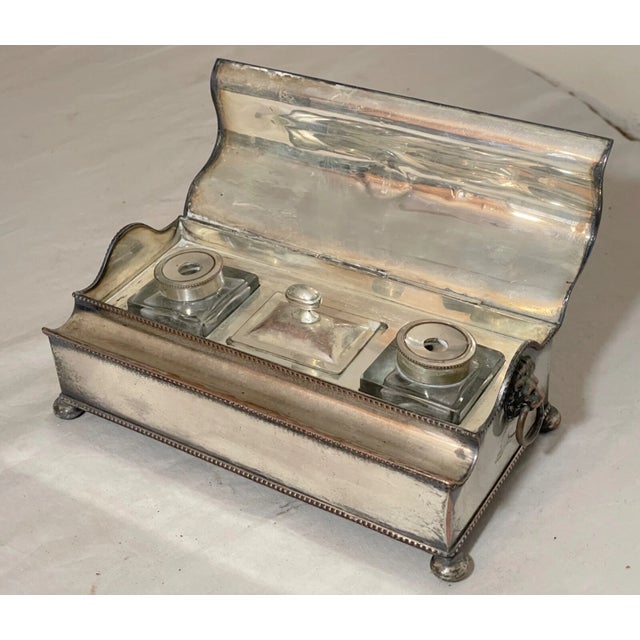 This antique 19th century desk inkwell stand is sure to add a touch of vintage charm to any collection. Made with silver...