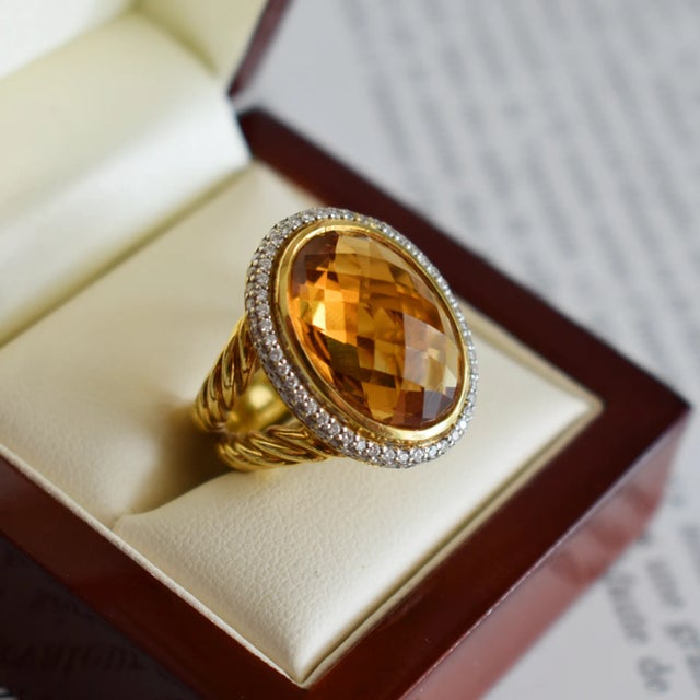 Vintage cocktail ring by jeweler David Yurman in 18K (750 thousandths) yellow gold. It is adorned with a checkerboard-cut...