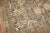 an early 20th Century Persian Bibikabad room-size rug in predominantly warm tones including accents in soft pink Measures:...